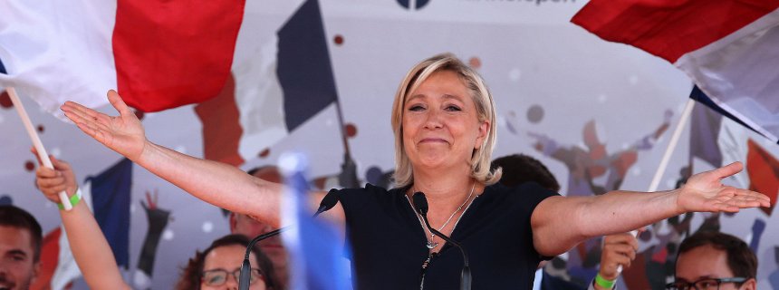 French far-right party Front National (FN) President and member of the European Parliament, Marine Le Pen gestures as she delivers a speech on September 3, 2016 during a FN political rally in Brachay, northeastern France.